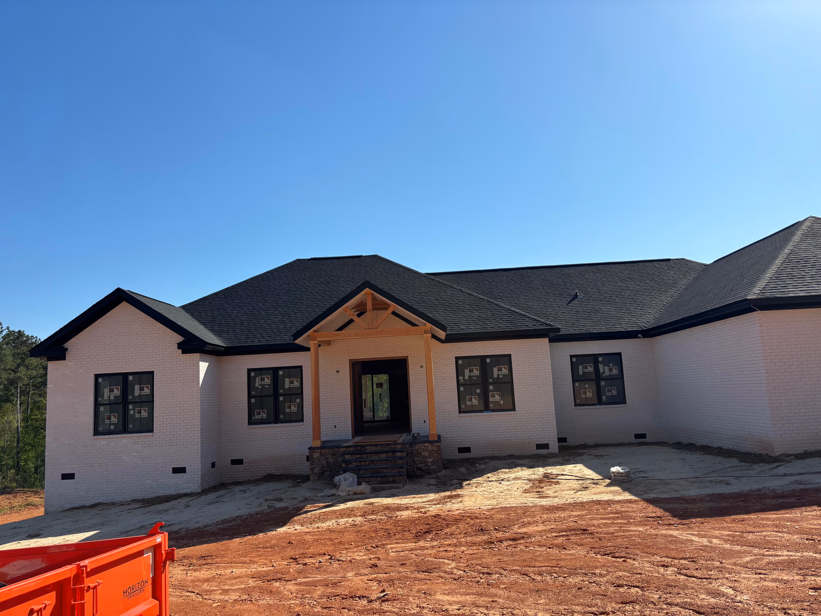 Custom home exterior — Triple H Builders