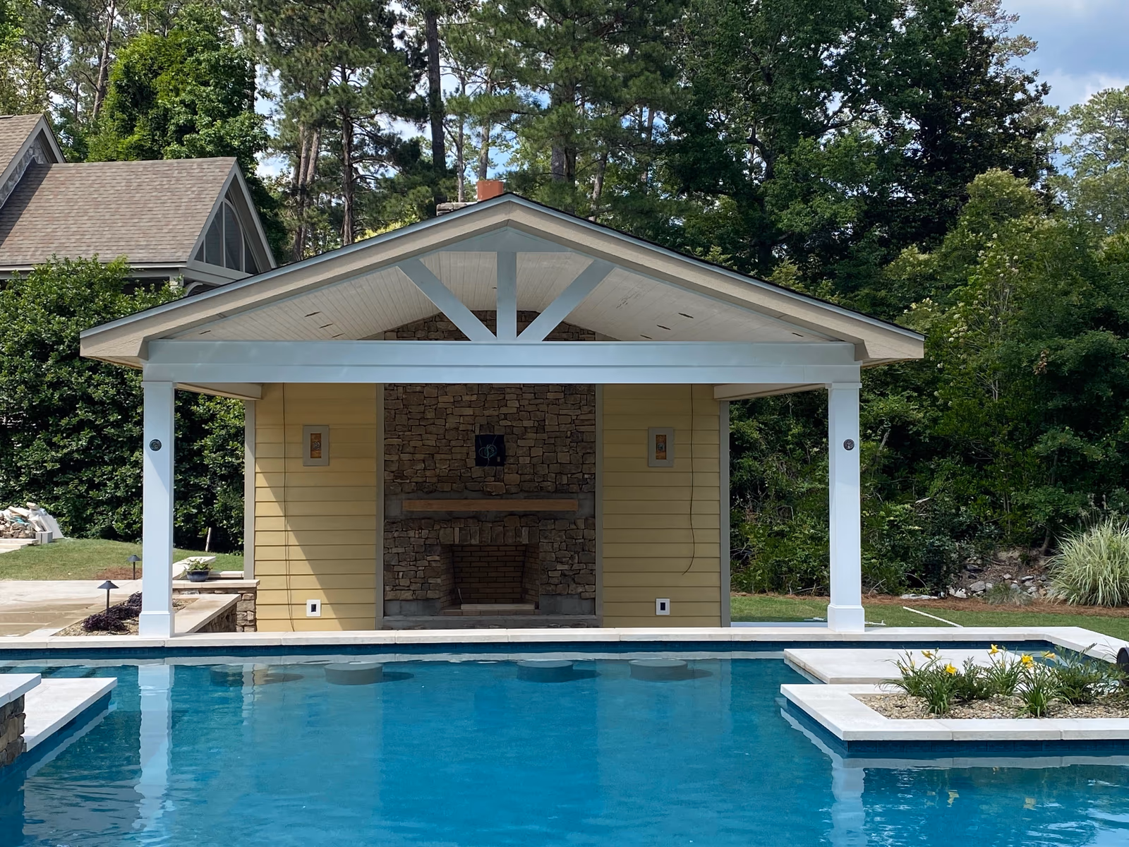 Pool house with large covered deck